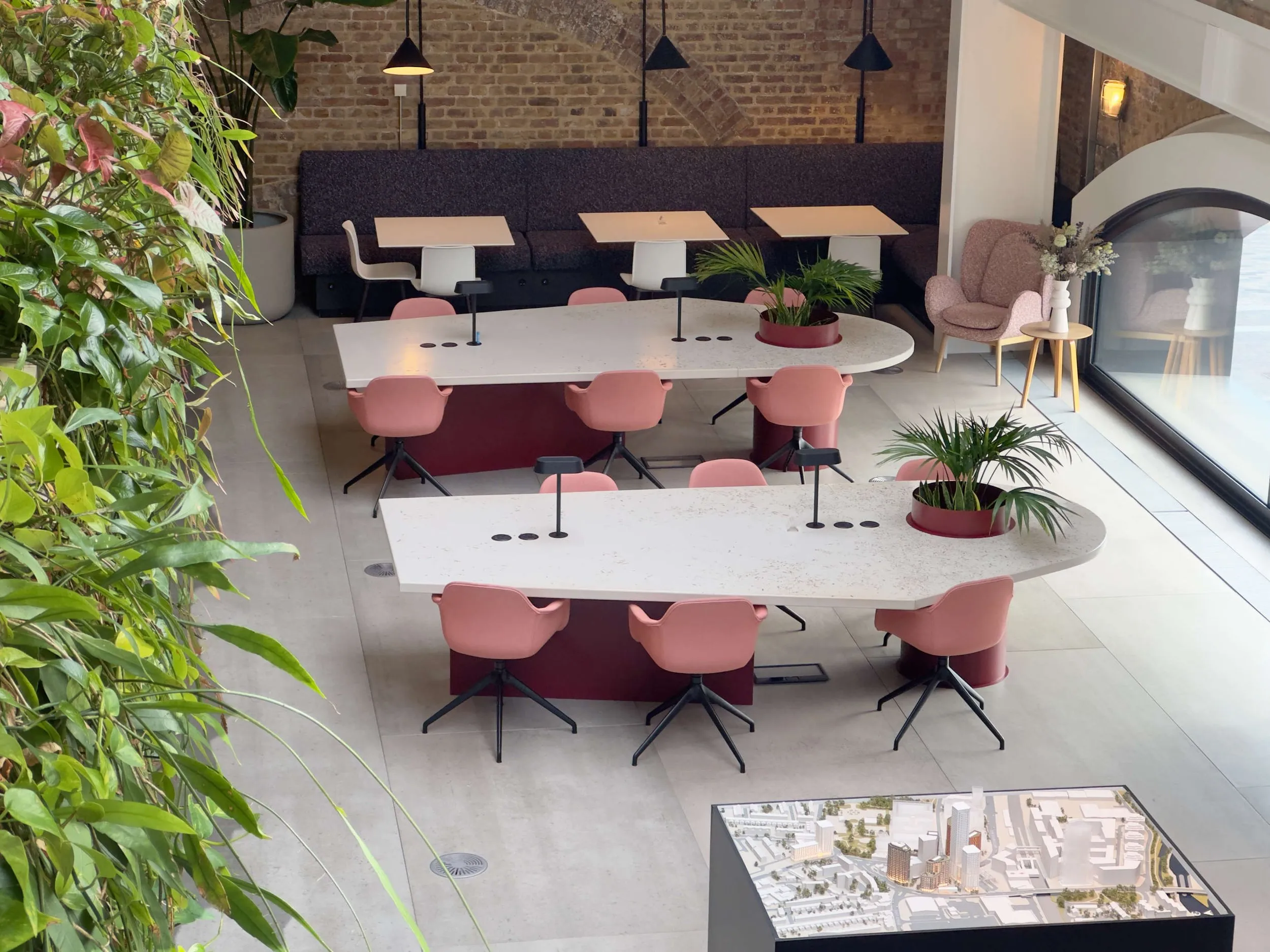 Bespoke terrazzo-style table tops with integrated planters - custom furniture London