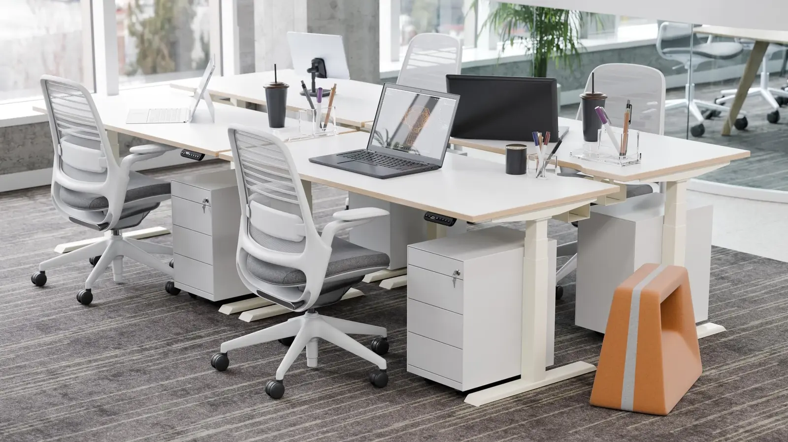 R!se electric sit-stand desks in modern London office - height adjustable desk UK