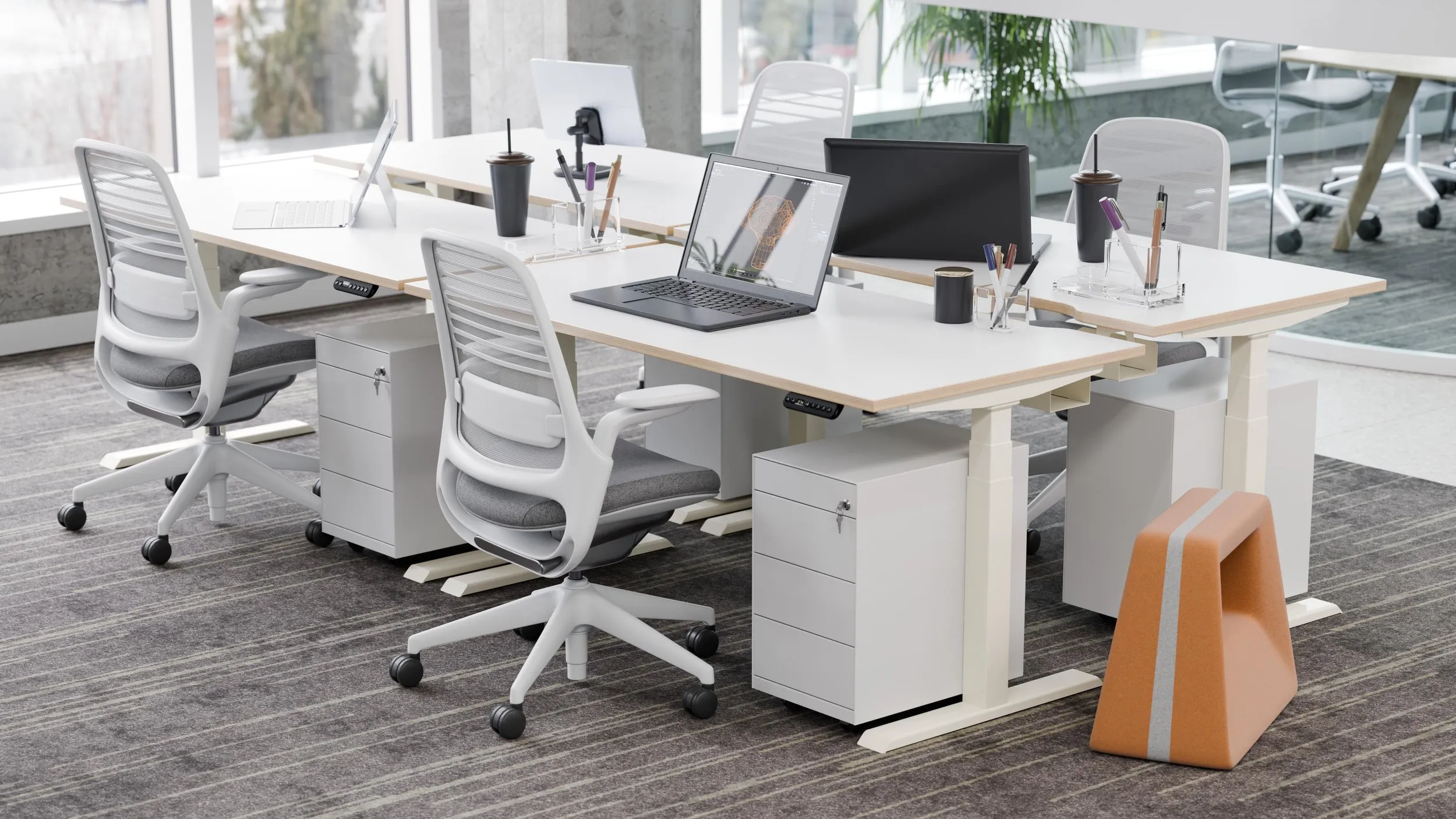 R!se electric sit-stand desks in modern London office - height adjustable desk UK