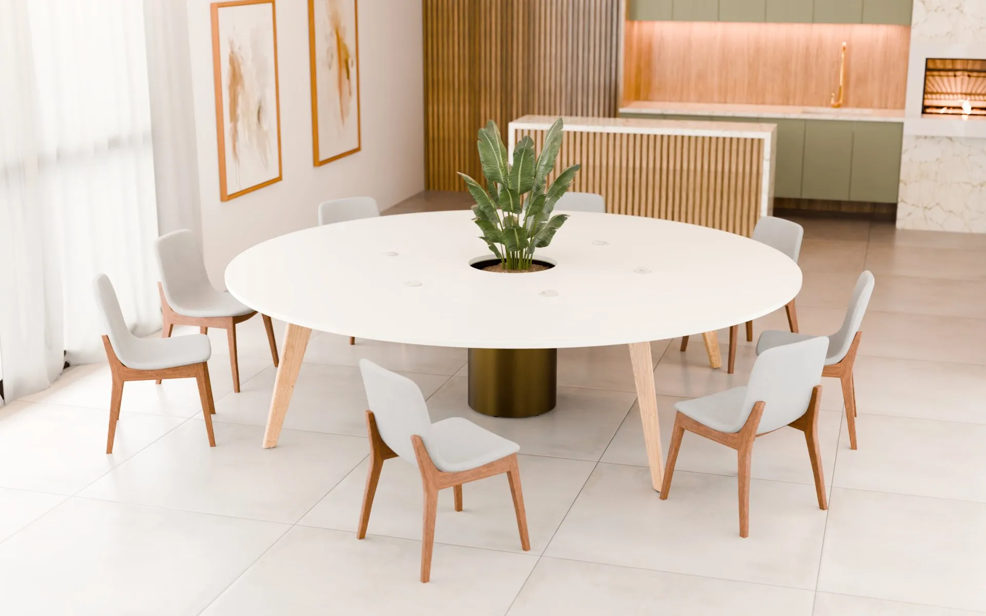 Orbital table in breakout area with bronze planter
