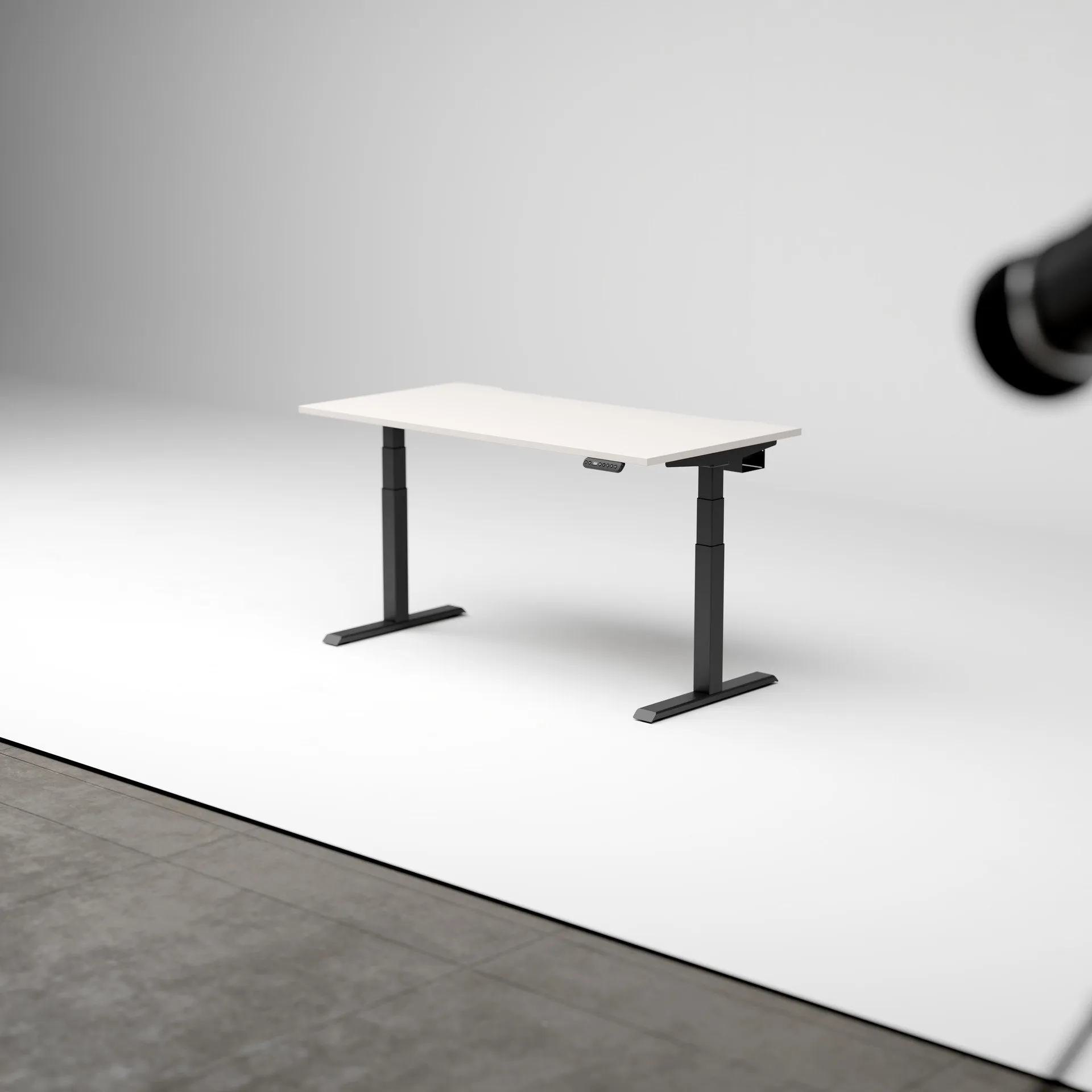 R!se height adjustable desk in professional photo studio
